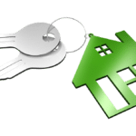 Keys with a green house logo